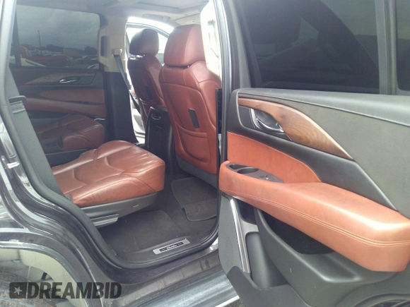 2018 Cadillac Escalade Luxury z VIN 1GYS3BKJ7JR204609, wystawiony jako IAAI lot #40951011 z przebiegiem 79 335 mil mil oraz . Historia ofert i sprzedaży dostępna na DreamBid. Obrazek 8.