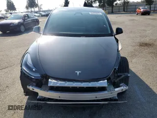 2024 Tesla Model Y Long Range with VIN 7SAYGAEE0RF018427, listed as a Copart auction lot 42455075 with 13,347 mi miles and Salvage Title. Bid and sale history available at DreamBid. Image 5.