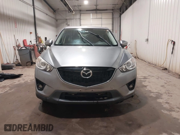 2015 Mazda CX-5 Grand Touring with VIN JM3KE4DY2F0477966, listed as a IAAI auction lot 41247178 with 116,582 mi miles. Bid and sale history available at carsss.com. Image 13.