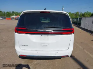 2023 Chrysler Pacifica Touring L with VIN 2C4RC1BG8PR625017, listed as a IAAI auction lot 42029628 with 62,221 mi miles. Bid and sale history available at carsss.com. Image 16.