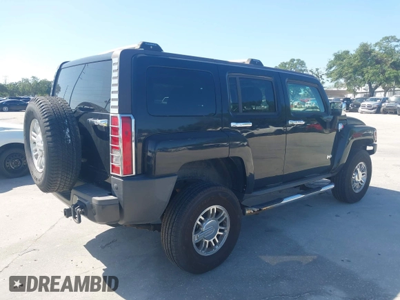 2007 Hummer H3 SUV with VIN 5GTDN13E878233953, listed as a IAAI auction lot 42012596 with 232,919 mi miles. Bid and sale history available at carsss.com. Image 4.