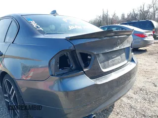 2007 BMW 3 Series 328xi with VIN WBAVC93587K031632, listed as a IAAI auction lot 41711350 with 184,703 mi miles. Bid and sale history available at carsss.com. Image 14.