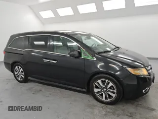 2015 Honda Odyssey Touring Elite with VIN 5FNRL5H95FB017434, listed as a Copart auction lot 55011035 with 111,254 mi miles and Clean title. Bid and sale history available at DreamBid. Image 4.