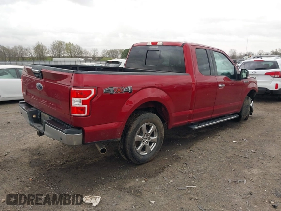 2018 Ford F-150 XL with VIN 1FTFX1E51JKF98962, listed as a IAAI auction lot 41827587 with 128,031 mi miles and . Bid and sale history available at DreamBid. Image 4.