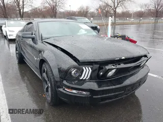 2007 Ford Mustang Deluxe with VIN 1ZVHT80N375320203, listed as a IAAI auction lot 41871055 with 80,891 mi miles. Bid and sale history available at carsss.com. Image 1.
