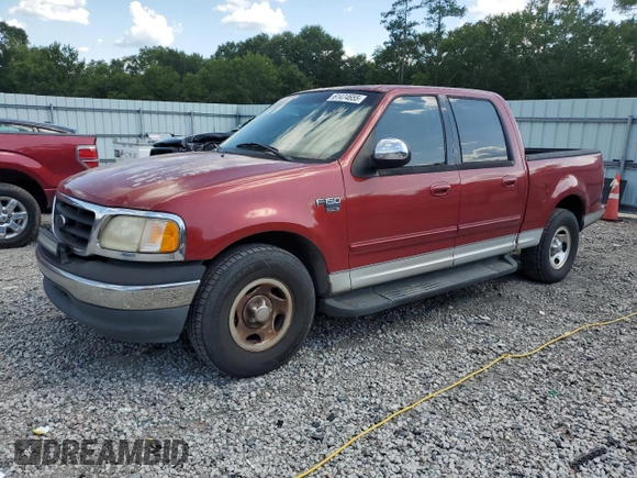 2001 Ford F-150 XLT with VIN 1FTRW07LX1KD65474, listed as a Copart auction lot 61474655 with 361,023 mi miles and Salvage title. Bid and sale history available at DreamBid. Image 1.