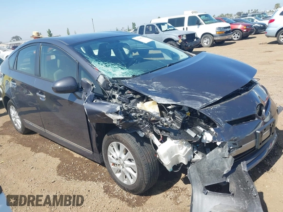 2012 Toyota Prius with VIN JTDKN3DP5C3011792, listed as a IAAI auction lot 42544789 with 127,704 mi miles and . Bid and sale history available at DreamBid. Image 1.