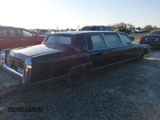1986 Cadillac Fleetwood z VIN 1G6DW69Y7G9732954, wystawiony jako IAAI lot #41780373 z przebiegiem 61 222 mil mil oraz . Historia ofert i sprzedaży dostępna na DreamBid. Obrazek 4.