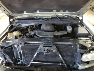 2004 Chevrolet Suburban LT z VIN 1GNFK16Z54J169373, wystawiony jako Copart lot #48302565 z przebiegiem 303 605 mil mil oraz Szkoda całkowita • Salvage title. Historia ofert i sprzedaży dostępna na DreamBid. Obrazek 12.