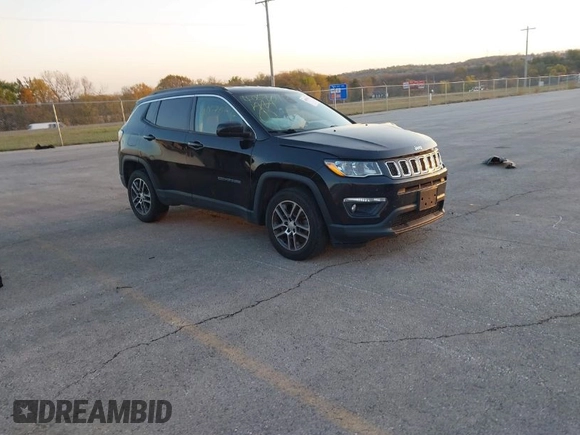 2017 Jeep Compass Latitude with VIN 3C4NJDBB8HT664781, listed as a IAAI auction lot 40670412 with 125,593 mi miles. Bid and sale history available at carsss.com. Image 1.