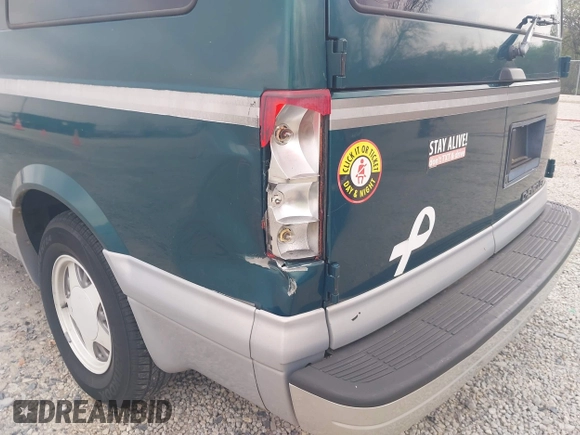 1997 Chevrolet Astro with VIN 1GNDM19W9VB205001, listed as a IAAI auction lot 42002535 with 136,734 mi miles. Bid and sale history available at carsss.com. Image 6.