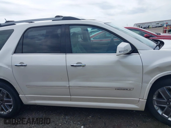 2012 GMC Acadia Denali with VIN 1GKKVTED5CJ197001, listed as a IAAI auction lot 42303383 with 211,958 mi miles and . Bid and sale history available at DreamBid. Image 13.