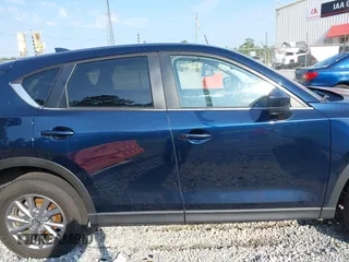 2023 Mazda CX-5 S Preferred with VIN JM3KFBCM1P0260992, listed as a IAAI auction lot 42192977 with 22,445 mi miles and . Bid and sale history available at carsss.com. Image 14.