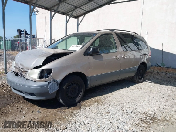 2002 Toyota Sienna LE with VIN 4T3ZF13C82U465335, listed as a IAAI auction lot 40274809 with 178,560 mi miles and . Bid and sale history available at DreamBid. Image 17.