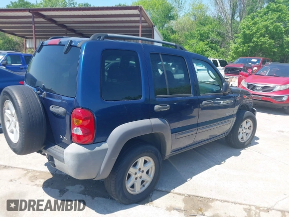 2004 Jeep Liberty Sport with VIN 1J4GK48KX4W241129, listed as a IAAI auction lot 41980258 with 259,048 mi miles and . Bid and sale history available at DreamBid. Image 4.