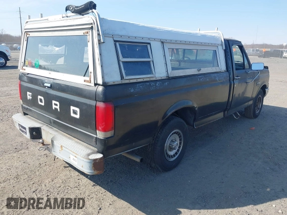 1987 Ford F-150 with VIN 2FTDF15Y2HCB10816, listed as a IAAI auction lot 41770760 with 86,290 mi miles. Bid and sale history available at carsss.com. Image 4.