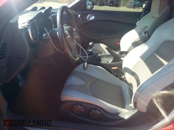 2010 Nissan 370Z Touring with VIN JN1AZ4FH0AM304490, listed as a Copart auction lot 67958964 with 96,386 mi miles and Salvage Title. Bid and sale history available at carsss.com. Image 7.