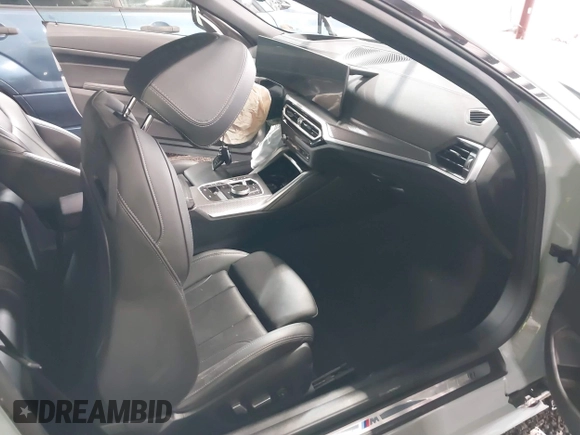 2024 BMW 4 Series 430i xDrive with VIN WBA43AT00RCN83317, listed as a IAAI auction lot 41211849 with 12,000 mi miles and . Bid and sale history available at DreamBid. Image 5.