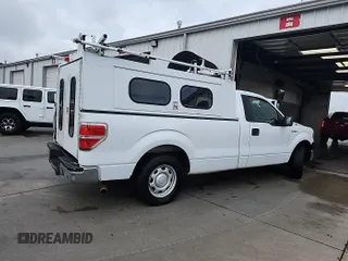 2014 Ford F-150 XL with VIN 1FTMF1CMXEKG22881, listed as a IAAI auction lot 42208463 with 190,778 mi miles and . Bid and sale history available at carsss.com. Image 1.