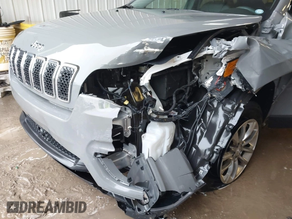 2021 Jeep Cherokee Latitude Lux with VIN 1C4PJMMX0MD214608, listed as a IAAI auction lot 41452997 with 31,441 mi miles and . Bid and sale history available at DreamBid. Image 6.