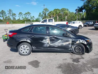 2012 Ford Focus SE with VIN 1FAHP3F22CL150631, listed as a IAAI auction lot 42594823 with 49,456 mi miles and . Bid and sale history available at DreamBid. Image 14.