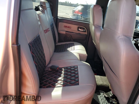 2012 GMC Canyon SLE1 with VIN 1GTD5MFE9C8108474, listed as a Copart auction lot 82650124 with 219,772 mi miles and Salvage Title. Bid and sale history available at carsss.com. Image 10.