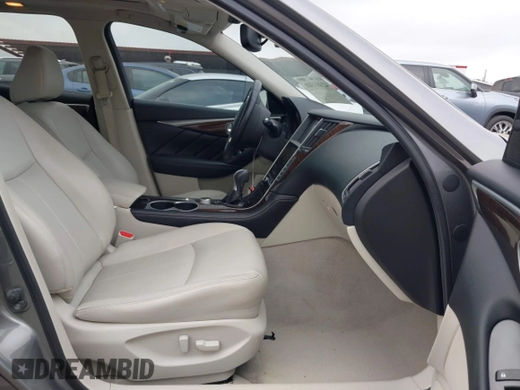 2015 Infiniti Q50 Premium z VIN JN1BV7AR7FM408015, wystawiony jako IAAI lot #42083301 z przebiegiem 58 817 mil mil oraz . Historia ofert i sprzedaży dostępna na DreamBid. Obrazek 5.