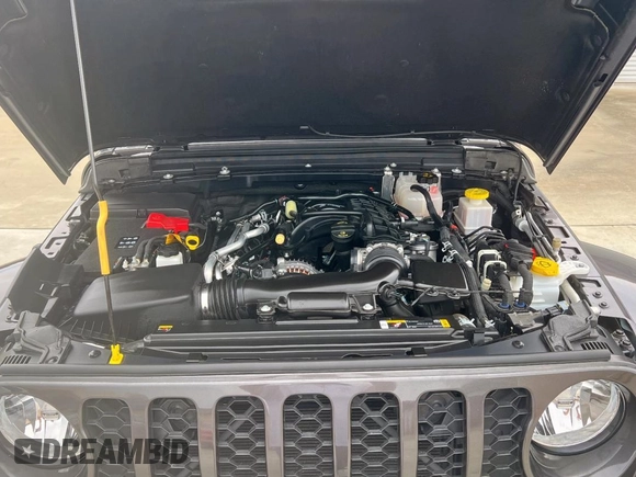 2023 Jeep Gladiator Sport S с VIN 1C6HJTAG6PL560425, выставлен на аукционе Copart как лот 67550135 с пробегом 16 967 миль миль и Чистый • Clean title. История ставок и продаж доступна на DreamBid. Изображение 7.