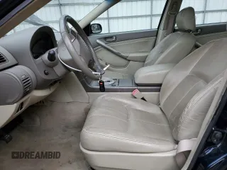 2003 Infiniti G35 with VIN JNKCV51EX3M001965, listed as a Copart auction lot 86999134 with 63,131 mi miles and Salvage Title. Bid and sale history available at DreamBid. Image 7.