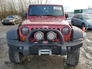 2013 Jeep Wrangler Rubicon с VIN 1C4HJWCG8DL520639, выставлен на аукционе Copart как лот 42458815 с пробегом 37 934 миль миль и Списание • Salvage title. История ставок и продаж доступна на DreamBid. Изображение 5.