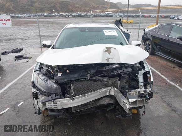 2020 Honda Civic EX-L with VIN 19XFC1F7XLE208720, listed as a IAAI auction lot 41725235 with 70,794 mi miles and . Bid and sale history available at DreamBid. Image 12.