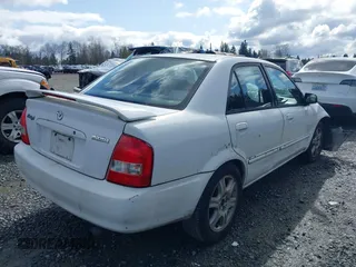 2002 Mazda Protege DX with VIN JM1BJ225520542854, listed as a IAAI auction lot 41955679 with 161,338 mi miles and . Bid and sale history available at DreamBid. Image 4.
