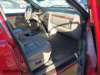 2004 Jeep Grand Cherokee Limited with VIN 1J8GW58N64C329504, listed as a IAAI auction lot 41785215 with 124,952 mi miles. Bid and sale history available at carsss.com. Image 5.