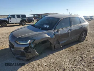 2024 Honda HR-V EX-L z VIN 3CZRZ1H73RM752865, wystawiony jako Copart lot #47676325 z przebiegiem 21 952 mil mil oraz Szkoda całkowita • Salvage title. Historia ofert i sprzedaży dostępna na DreamBid. Obrazek 1.