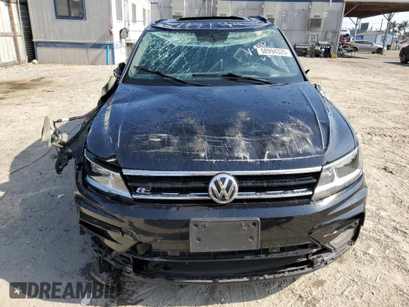 2021 Volkswagen Tiguan SE with VIN 3VV3B7AXXMM069410, listed as a Copart auction lot 58994325 with 55,846 mi miles and Salvage title. Bid and sale history available at DreamBid. Image 5.