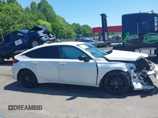 2023 Honda Civic Sport z VIN 19XFL2H84PE019966, wystawiony jako IAAI lot #42137182 z przebiegiem 52 844 mil mil oraz . Historia ofert i sprzedaży dostępna na DreamBid. Obrazek 13.