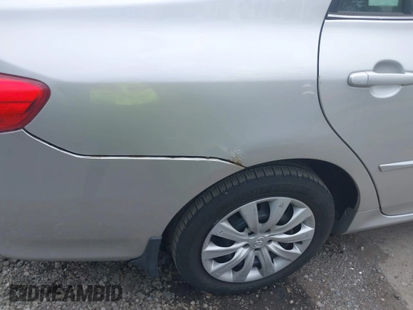 2013 Toyota Corolla L with VIN 2T1BU4EEXDC052854, listed as a IAAI auction lot 42230118 with 156,120 mi miles and . Bid and sale history available at DreamBid. Image 17.