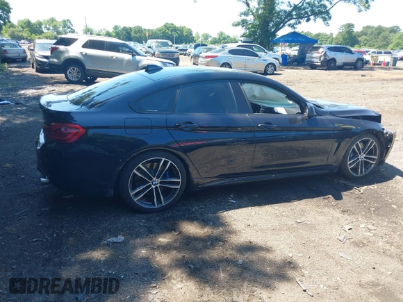 2019 BMW 4 Series 440i xDrive with VIN WBA4J7C57KBM76622, listed as a IAAI auction lot 39738945 with 79,540 mi miles and . Bid and sale history available at carsss.com. Image 13.