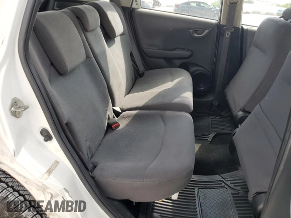2013 Honda Fit с VIN JHMGE8H36DC045573, выставлен на аукционе Copart как лот 59525075 с пробегом 91 355 миль миль и Списание • Salvage title. История ставок и продаж доступна на DreamBid. Изображение 10.