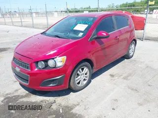 2016 Chevrolet Sonic LT with VIN 1G1JC6SH7G4127373, listed as a IAAI auction lot 41970423 with 130,440 mi miles. Bid and sale history available at carsss.com. Image 2.