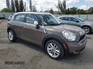 2014 MINI Countryman S with VIN WMWZC3C57EWP29072, listed as a Copart auction lot 54508905 with 105,192 mi miles and Clean Title. Bid and sale history available at DreamBid. Image 4.