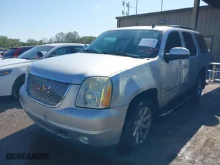 2010 GMC Yukon Denali with VIN 1GKUKEEF8AR104016, listed as a IAAI auction lot 42004250 with 274,459 mi miles. Bid and sale history available at carsss.com. Image 2.