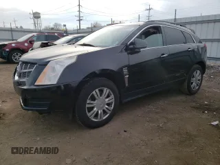 2011 Cadillac SRX z VIN 3GYFNGEY3BS574536, wystawiony jako Copart lot #37150014 z przebiegiem 200 572 mil mil oraz Szkoda całkowita • Salvage title. Historia ofert i sprzedaży dostępna na DreamBid. Obrazek 1.