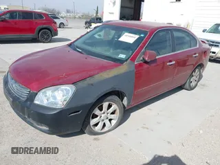 2007 Kia Optima EX with VIN KNAGE124375088526, listed as a IAAI auction lot 41526854 with 285,908 mi miles. Bid and sale history available at carsss.com. Image 2.