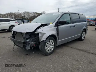 2019 Dodge Grand Caravan SE with VIN 2C4RDGBGXKR642247, listed as a Copart auction lot 54124295 with 153,163 mi miles and Salvage Title. Bid and sale history available at DreamBid. Image 1.
