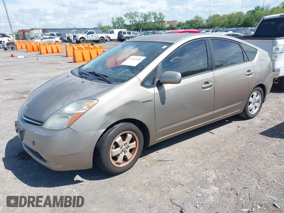 2006 Toyota Prius with VIN JTDKB20U667543726, listed as a IAAI auction lot 42101090 with 196,358 mi miles. Bid and sale history available at carsss.com. Image 2.