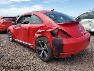 2012 Volkswagen Beetle 2.0T Turbo PZEV with VIN 3VWVA7AT5CM654978, listed as a Copart auction lot 66766654 with 60,842 mi miles and Salvage Title. Bid and sale history available at carsss.com. Image 2.