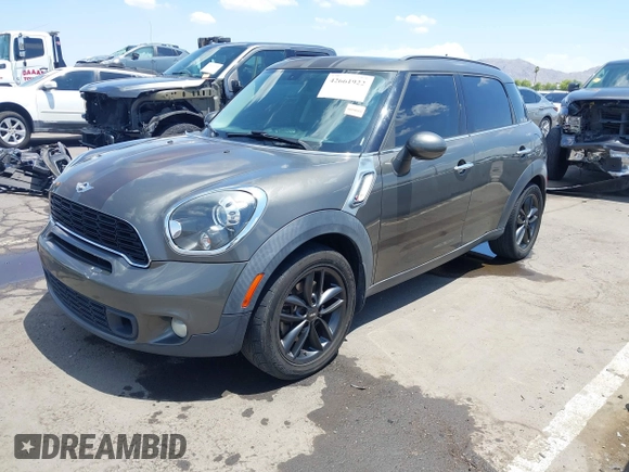 2014 MINI Countryman S with VIN WMWZC3C59EWP29137, listed as a IAAI auction lot 42661922 with 128,064 mi miles and . Bid and sale history available at DreamBid. Image 17.
