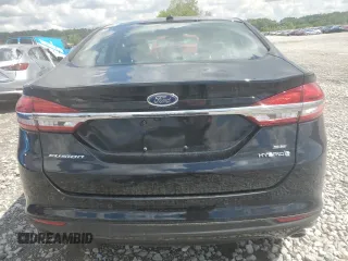 2018 Ford Fusion SE z VIN 3FA6P0LU6JR273861, wystawiony jako Copart lot #55722005 z przebiegiem 127 633 mil mil oraz Szkoda całkowita • Salvage title. Historia ofert i sprzedaży dostępna na DreamBid. Obrazek 6.