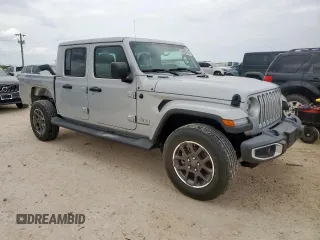 2022 Jeep Gladiator High Altitude with VIN 1C6HJTFGXNL163998, listed as a Copart auction lot 56490755 with 52,474 mi miles and Salvage title. Bid and sale history available at DreamBid. Image 4.